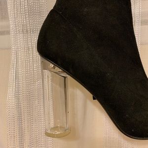 Thigh high boots with clear heels